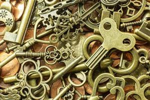 Old vintage keys gold texture on copper coin  abstract background. photo