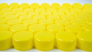 yellow Bottle  plastic cap for ego background. photo