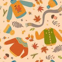 Autumn seamless pattern with clothes and leaves. Vector graphics.