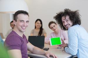 Startup Business Team At A Meeting at modern office building photo