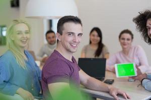 Startup Business Team At A Meeting at modern office building photo