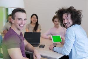 Startup Business Team At A Meeting at modern office building photo