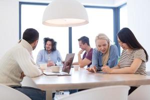 Startup Business Team At A Meeting at modern office building photo