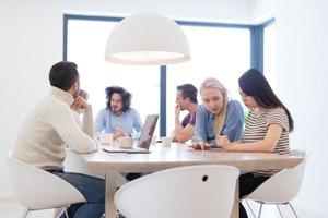 Startup Business Team At A Meeting at modern office building photo