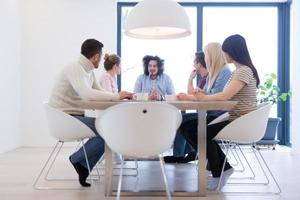 Startup Business Team At A Meeting at modern office building photo