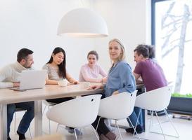 Startup Business Team At A Meeting at modern office building photo