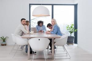 Startup Business Team At A Meeting at modern office building photo