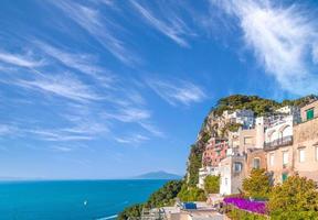 Italy, scenic views of Capri from boat cruise around the island photo