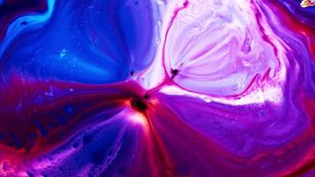 kleurrijke inkt achtergrond. abstracte kleurrijke verf inkt vloeistof ontploffen diffusie psychedelische explosie beweging video