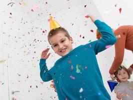 kids  blowing confetti photo