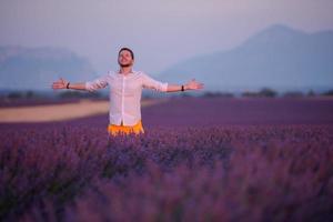 man in lavender flower field photo