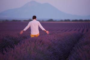 man in lavender  field photo