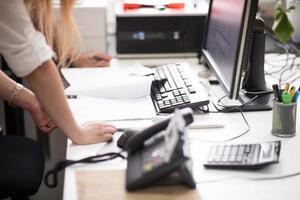 designers in office at the wooden furniture manufacture photo