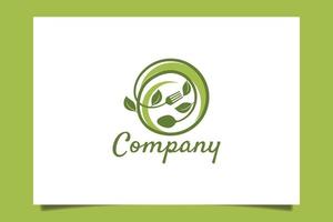 Fresh food logo with a fork and spoon like a plant that grows in a circle forming a plate vector