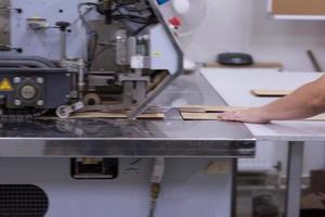 engineer in front of wood cutting machine photo