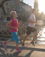 Couple jogging outside photo