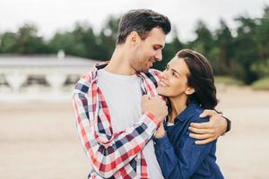 Boyfriend and girlfriend embrace photo