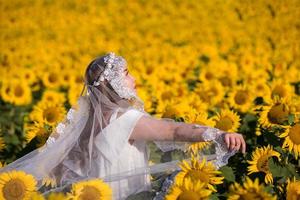 asian woman at sunflower field photo