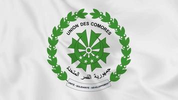 national emblem coat of arms or symbol of Comoros in waving flag. smooth 4k video seemless loop