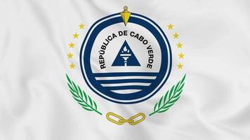 emblema nacional escudo de armas o símbolo de la república de cabo verde, cabo verde, en bandera ondeante. Bucle suave de video 4k sin problemas