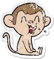 distressed sticker of a crazy cartoon monkey sitting vector