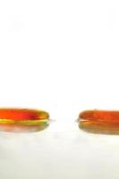 isolated wet zen stones with splashing  water drops photo