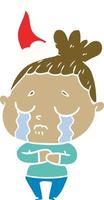 flat color illustration of a crying woman wearing santa hat vector