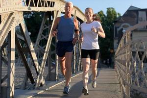 Couple jogging outside photo