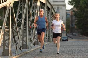 Couple jogging outside photo