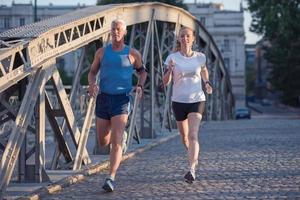 Couple jogging outside photo