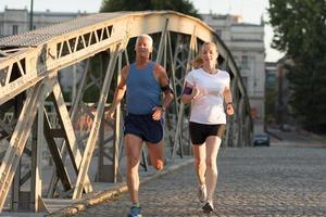 Couple jogging outside photo