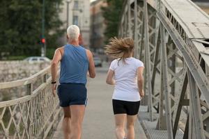 Couple jogging outside photo