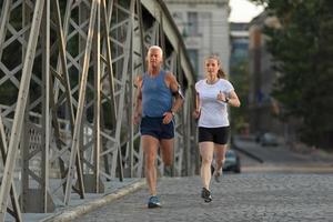 Couple jogging outside photo