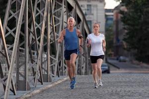 Couple jogging outside photo