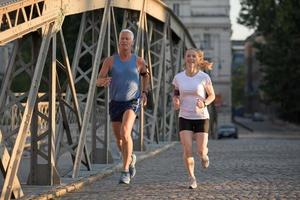 Couple jogging outside photo