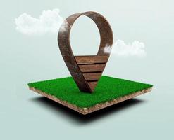 Wooden location pin icon on cubical soil land geology cross section with green grass, ground ecology isolated on blue sky. 3d illustration. photo