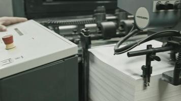Printing process - feeding sheets of paper, polygraph industry video