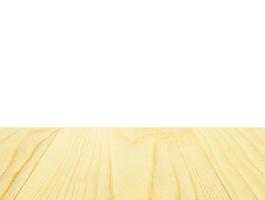 Empty wooden table top for product placement with white background photo