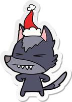 angry wolf sticker cartoon of a wearing santa hat vector