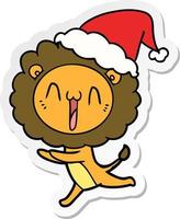 happy sticker cartoon of a lion wearing santa hat vector