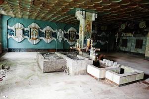 Industrial interior of an old porcelain abandoned factory. photo