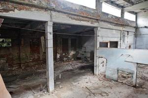 Industrial interior of an old abandoned factory. photo