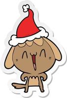 cute sticker cartoon of a dog wearing santa hat vector