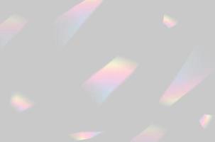 resumen de la superposición de luz de prisma de arco iris borrosa sobre fondo gris para maqueta y decoración foto