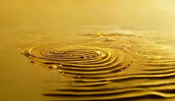 Abstract of gold glitter bright ripple background for christmas holiday decoration, illustration photo