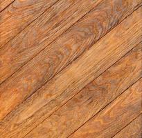 Beautiful texture of natural brown planks arranged diagonally. photo