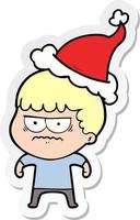 sticker cartoon of a annoyed man wearing santa hat vector