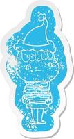 cartoon distressed sticker of a friendly boy with books wearing santa hat vector