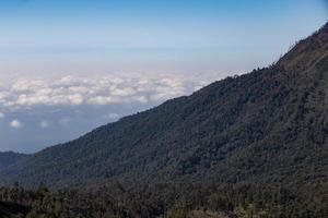 View from the tropical forest with path to the volcano Kawah Ijen, East Java, Indoneisa photo