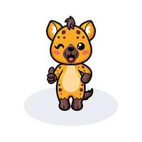 Cute baby hyena cartoon giving thumbs up vector